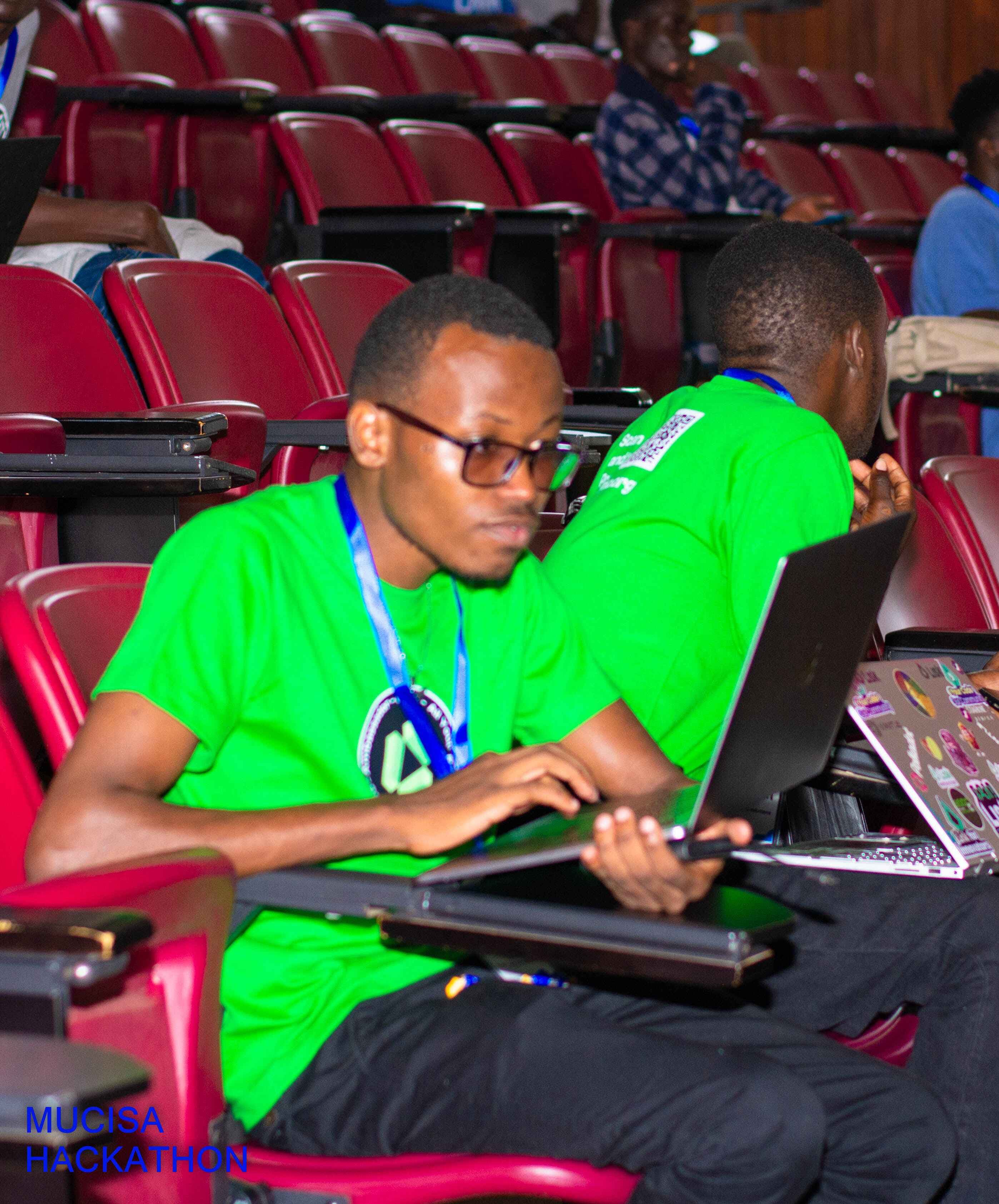 Student coding at MUCISA Hackathon